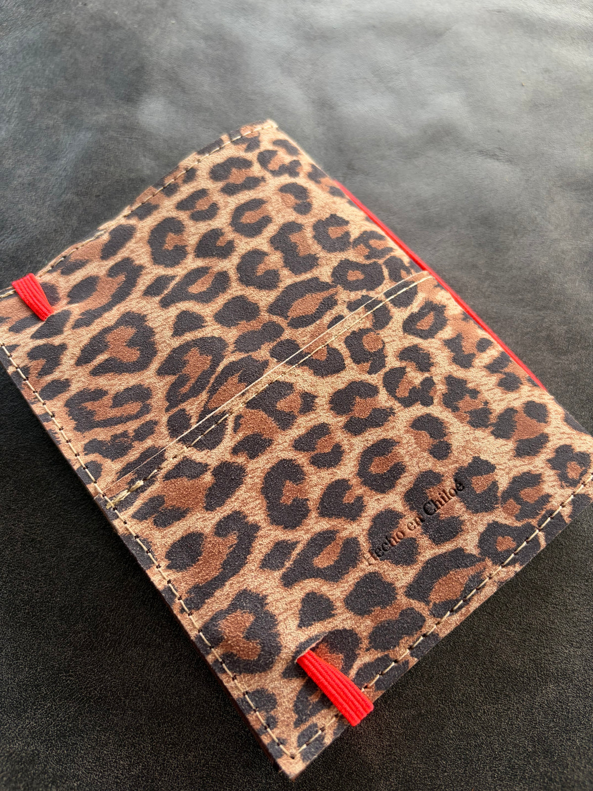 Libreta eterna cuero animal print elástico neon