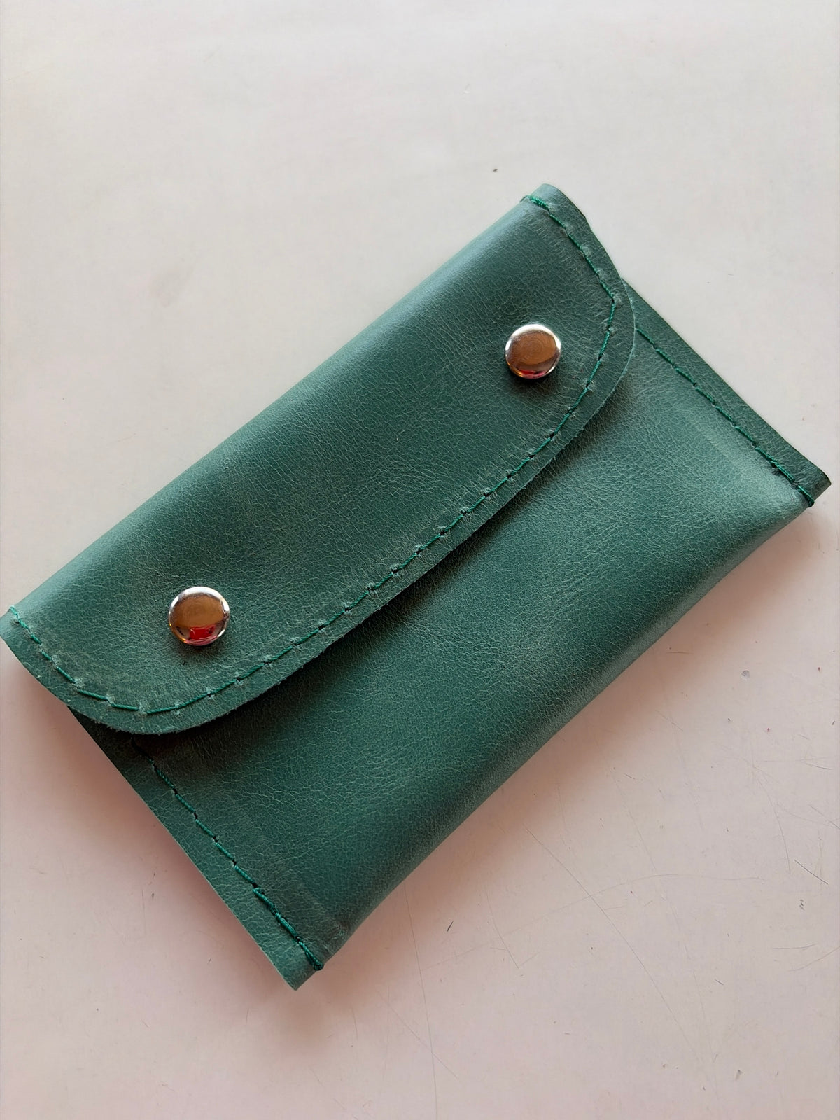 Tarjetero doble broche turquesa