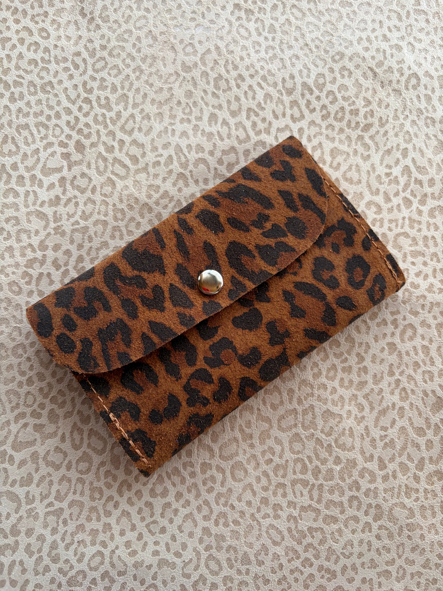 Joyero de cartera aninal print avellana