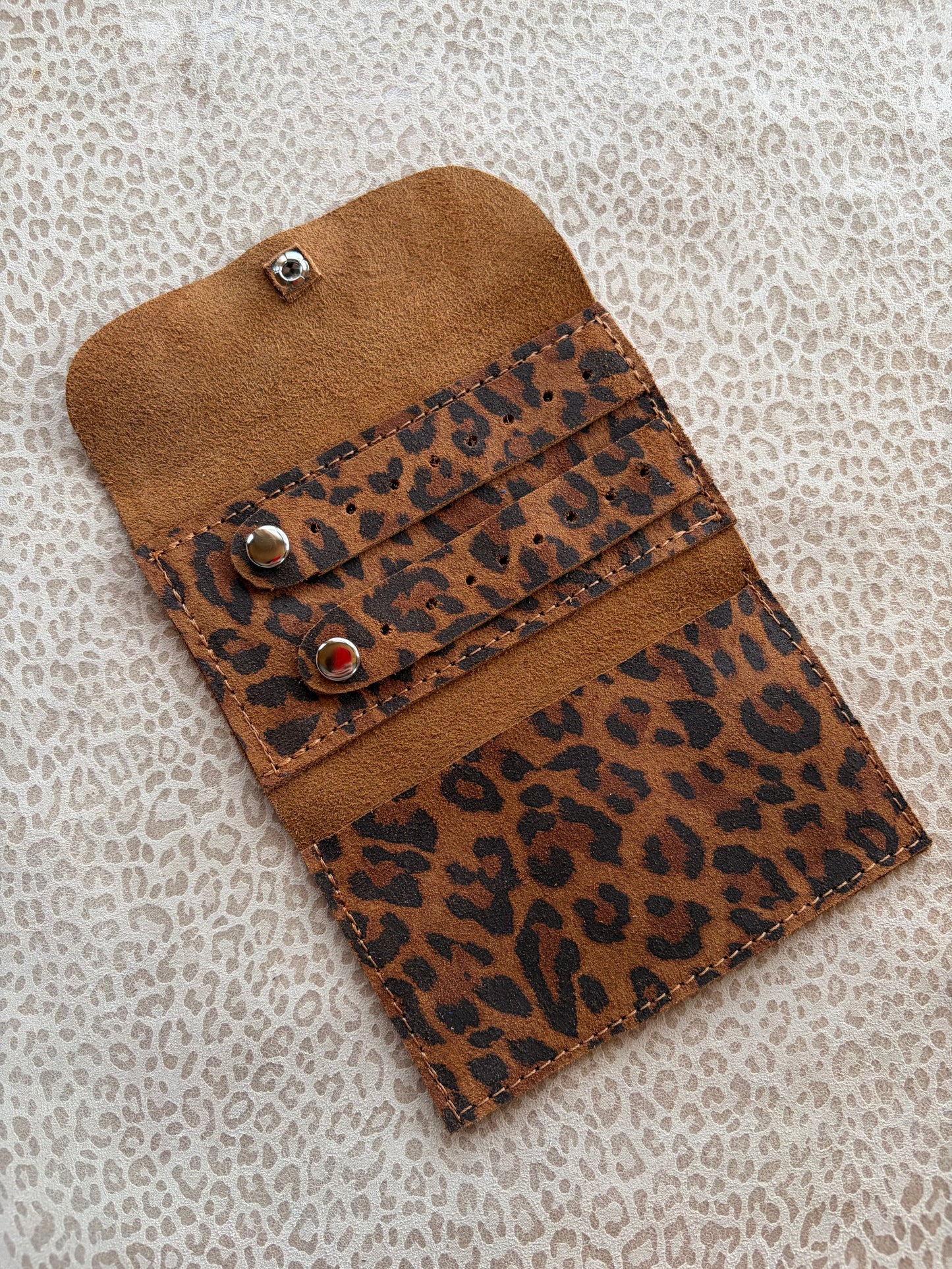 Joyero de cartera aninal print avellana