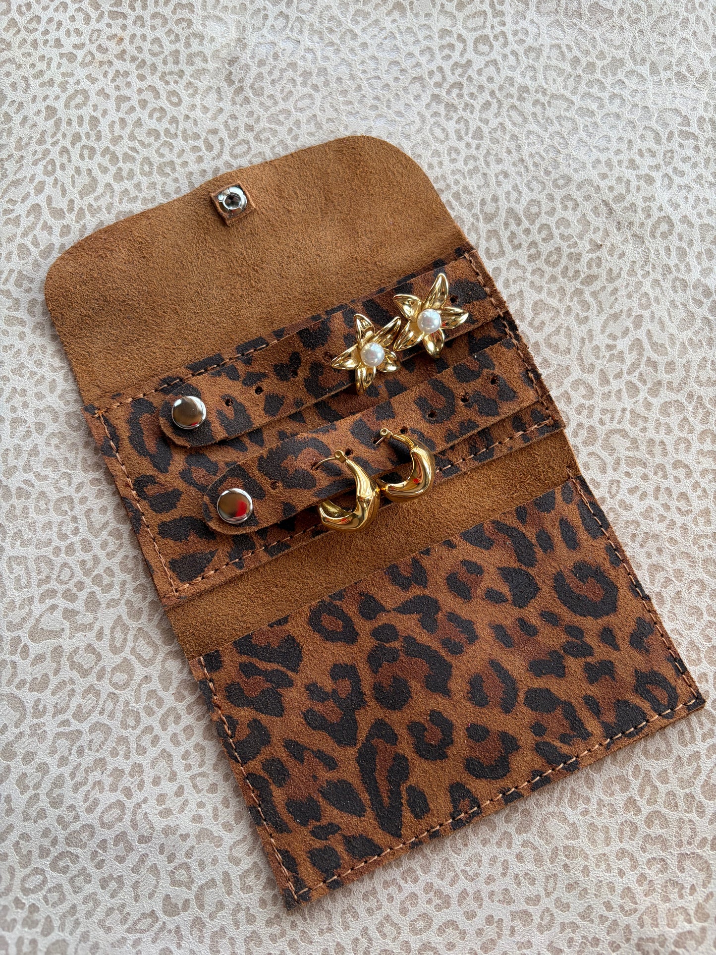 Joyero de cartera aninal print avellana