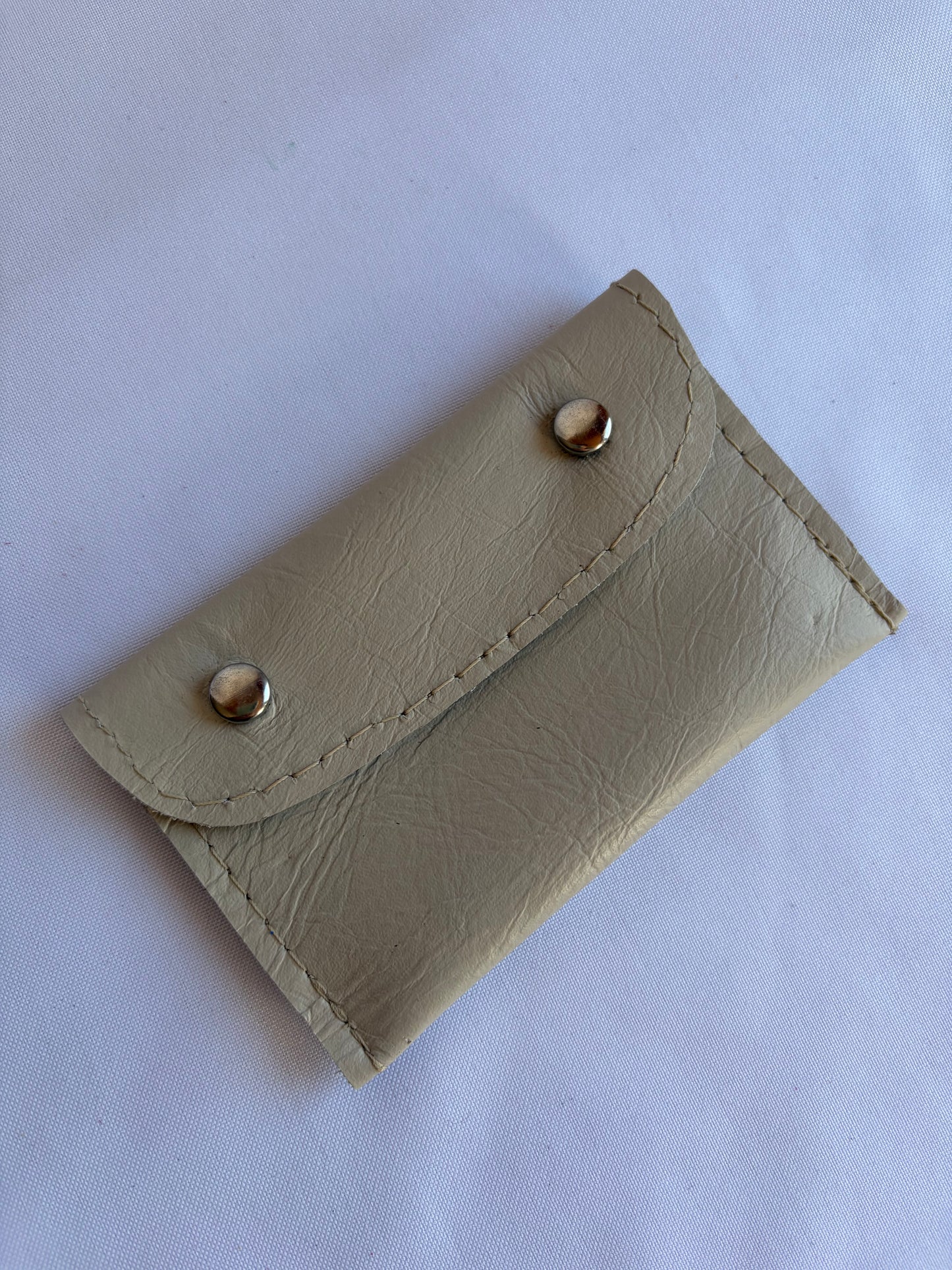 Tarjetero doble broche nude