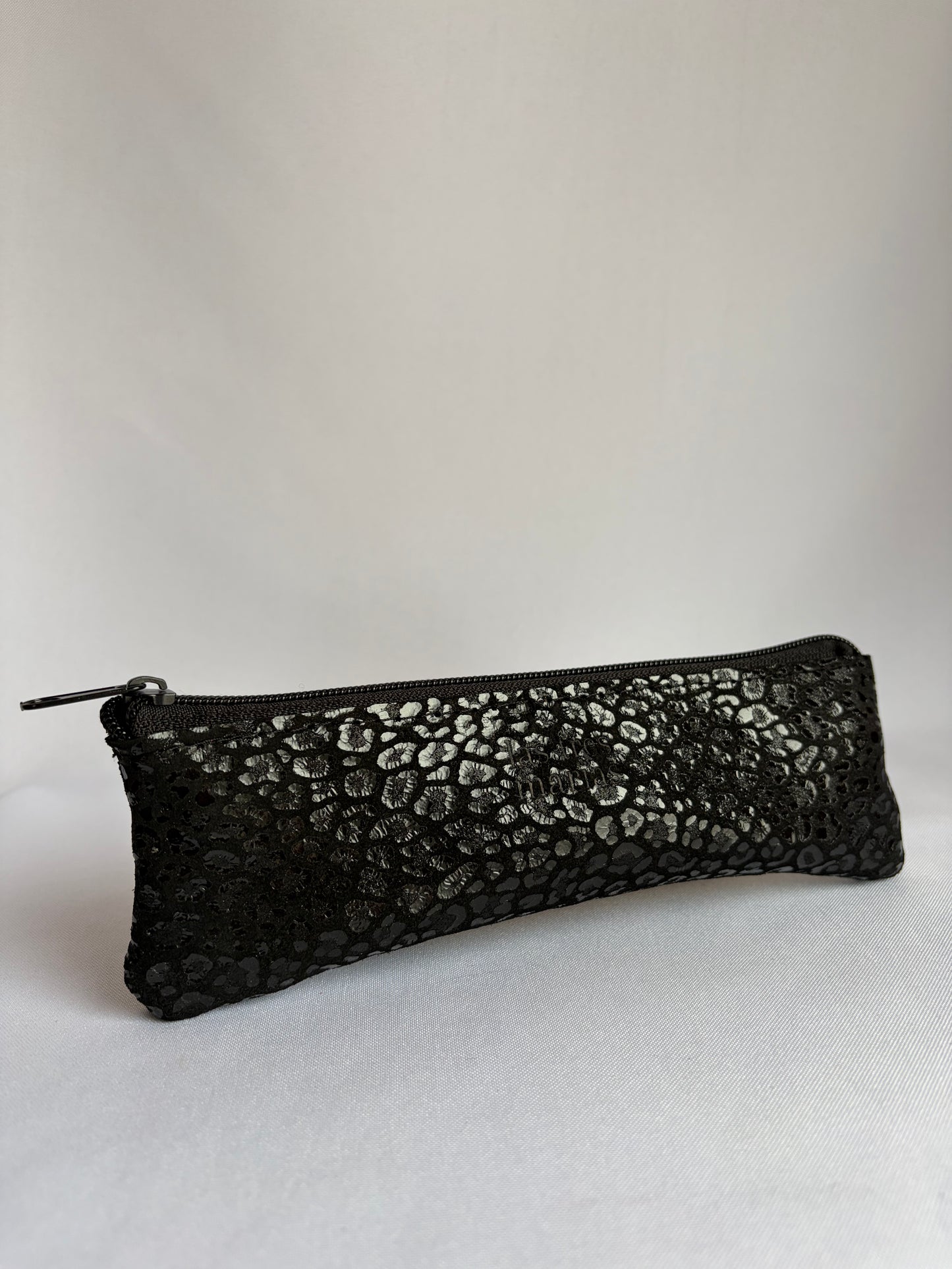 Estuche de cuero chita negro